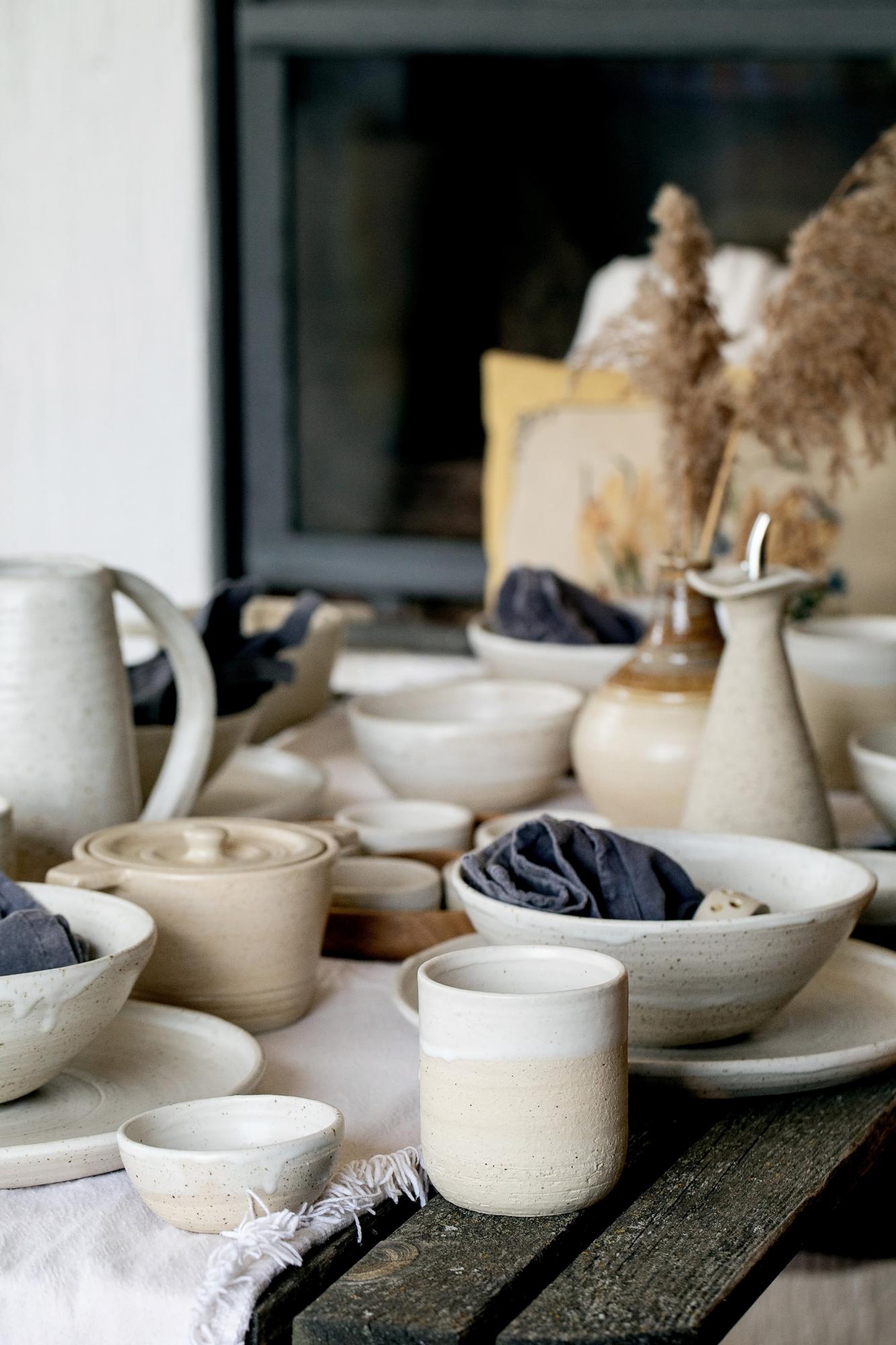 Rustic table setting with linen and ceramics