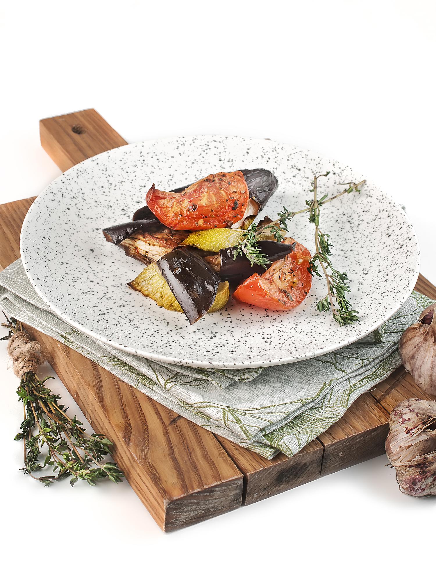 Close-up of plated seasonal dish on rustic table